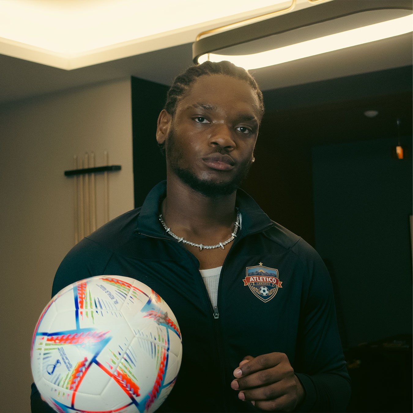 Atlético Cartago player wearing the Allianz Jacket